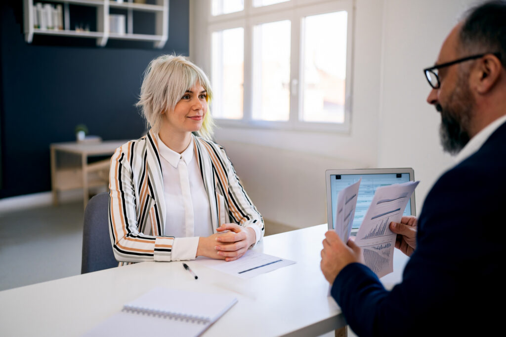 Adult female entrepreneur is meeting with their financial advisor