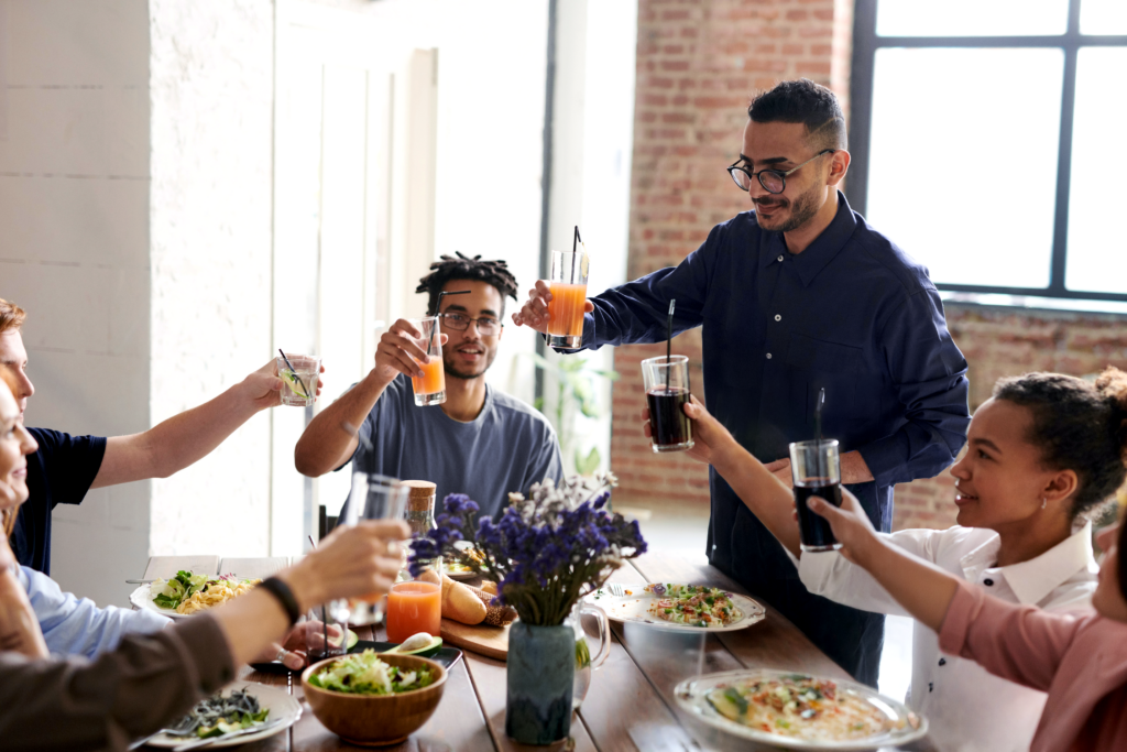 family happily celebrating an occasion at the dinner table